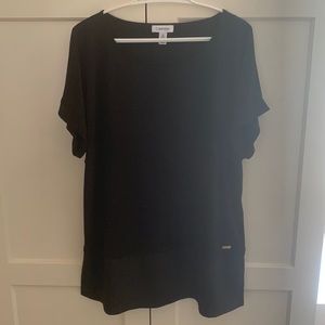 Calvin Klein stretch-knit shirt, with dressy straight shirttail hem